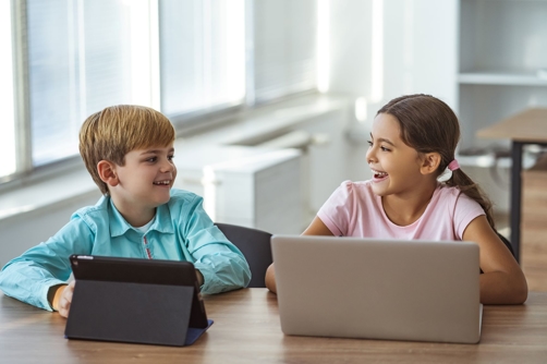 Image-Only-Boy-and-Girl-on-Computer Image-Only-Boy-and-Girl-on-Computer